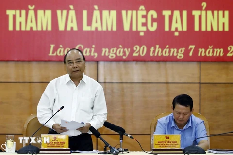 Thủ tướng Nguyễn Xuân Phúc làm việc với cán bộ chủ chốt tỉnh Lào Cai. (Ảnh: Thống Nhất/TTXVN)
