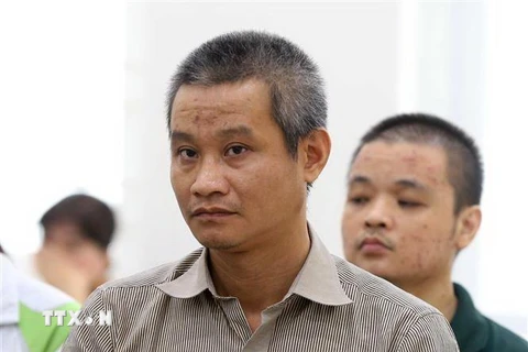 Bị cáo Trịnh Trọng Trung (sinh năm 1976), thủ kho vật chứng Cục Thi hành án dân sự thành phố Hà Nội tại phiên tòa. (Ảnh: Doãn Tấn/TTXVN)