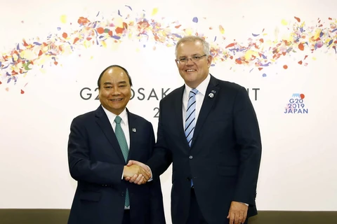 Thủ tướng Nguyễn Xuân Phúc gặp Thủ tướng Australia Scott Morrison nhân chuyến tham dự Hội nghị cấp cao G20 tại Nhật Bản vào tháng 6/2019. (Ảnh: Thống Nhất/TTXVN)