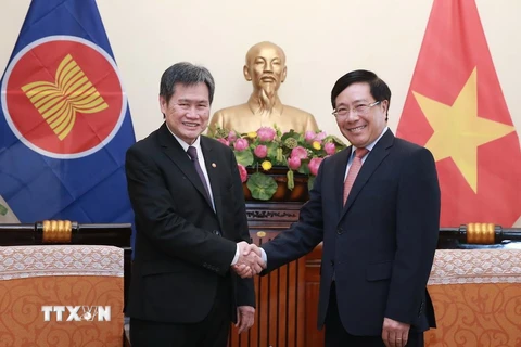 Phó Thủ tướng, Bộ trưởng Ngoại giao Phạm Bình Minh tiếp Tổng Thư ký ASEAN Lim Jock Hoi. (Ảnh: Lâm Khánh/TTXVN)