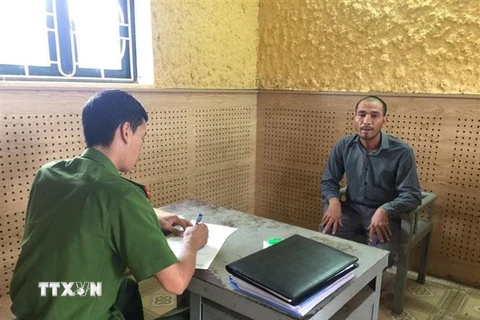 Đối tượng Dương Viết Linh Tú tại Cơ quan cảnh sát điều tra Công an tỉnh Quảng Bình. (Ảnh: TTXVN)