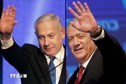 Thủ tướng sắp mãn nhiệm của Israel Benjamin Netanyahu (trái) ngày 19/9 kêu gọi đối thủ chính của mình là Benny Gantz (phải) thuộc đảng trung dung Xanh-Trắng chung tay lập liên minh đoàn kết. (Ảnh: AFP/TTXVN)