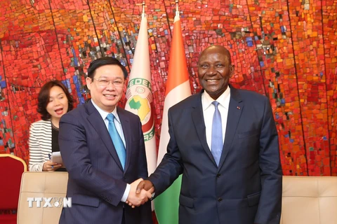 Phó Tổng thống Côte d'Ivoire tiếp Phó Thủ tướng Chính phủ Vương Đình Huệ. (Ảnh: Phi Hùng/TTXVN)