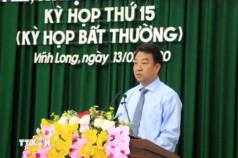 Tân Chủ tịch Ủy ban Nhân dân tỉnh Vĩnh Long Lữ Quang Ngời phát biểu nhận nhiệm vụ. (Ảnh: Phạm Minh Tuấn/TTXVN)