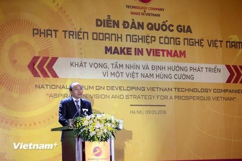 Thủ tướng Nguyễn Xuân Phúc phát biểu tại Diễn đàn quốc gia phát triển doanh nghiệp công nghệ Việt Nam. (Ảnh: Minh Sơn/Vietnam+)