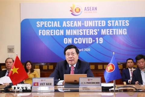Phó Thủ tướng, Bộ trưởng Bộ Ngoại giao Phạm Bình Minh phát biểu tại Hội nghị trực tuyến đặc biệt cấp Bộ trưởng Ngoại giao ASEAN-Hoa Kỳ về ứng phó dịch bệnh COVID-19. (Ảnh: Lâm Khánh/TTXVN)