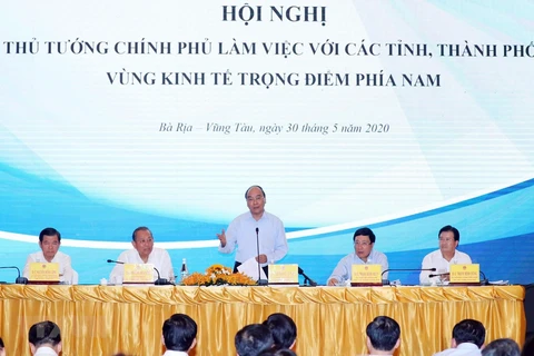 Thủ tướng Chính phủ Nguyễn Xuân Phúc chủ trì buổi làm việc của Thường trực Chính phủ với lãnh đạo các tỉnh, thành phố Vùng kinh tế trọng điểm phía Nam. (Ảnh: Thống Nhất/TTXVN)