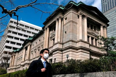 Ngân hàng Trung ương Nhật Bản tăng hỗ trợ các doanh nghiệp chịu tác động của dịch COVID-19. (Nguồn: AFP)