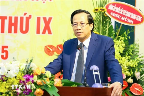 Ông Đào Ngọc Dung, Ủy viên Trung ương Đảng, Bí thư Ban Cán sự, Bộ trưởng Bộ Lao động, Thương binh và Xã hội phát biểu tại Đại hội. (Ảnh: TTXVN)