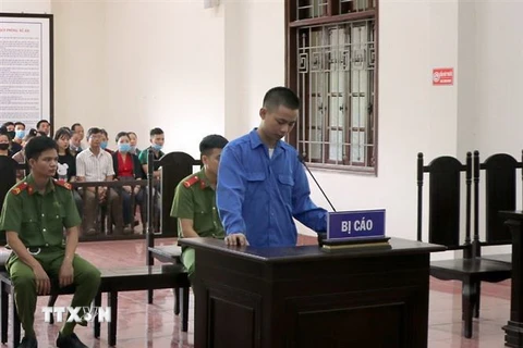 Nguyễn Văn Khiển nghe tòa tuyên án. (Ảnh: Thanh Hải/TTXVN)
