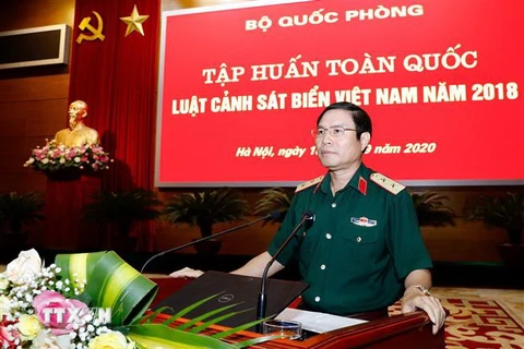 Trung tướng Nguyễn Tân Cương, Thứ trưởng Bộ Quốc phòng phát biểu khai mạc hội nghị. (Ảnh: Dương Giang/TTXVN)