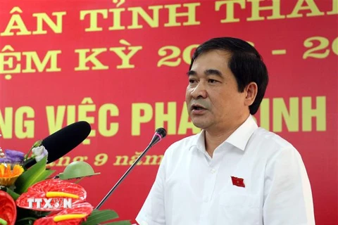 Ông Nguyễn Tiến Thành, Phó Bí thư thường trực Tỉnh ủy, Chủ tịch HĐND tỉnh phát biểu tại kỳ họp. (Ảnh: Nguyễn Công Hải/TTXVN)