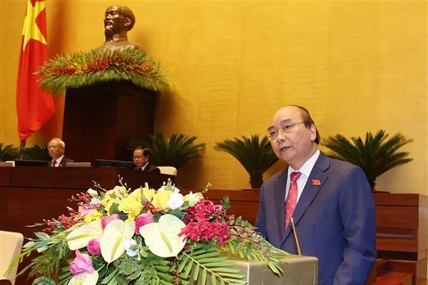 Thủ tướng Nguyễn Xuân Phúc trình bày báo cáo kết quả thức hiện kế hoạch phát triển kinh tế - xã hội năm 2020 và 5 năm 2016 - 2020, dự kiến kế hoạch phát triển kinh tế -xã hội năm 2021, mục tiêu chủ yếu và một số nhiệm vụ , giải pháp phát triển kinh tế - x