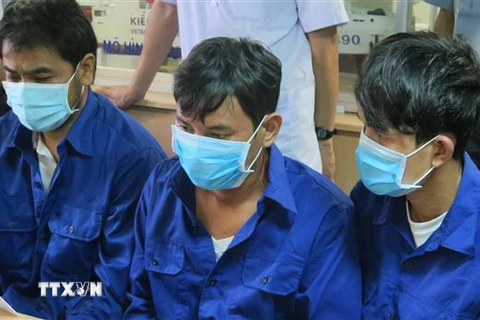 Ba ngư dân tàu cá BĐ 97469 TS: Huỳnh Xuân Phi, Võ Văn Hoài và Lê Minh Don đều trú tại huyện Hoài Nhơn, tỉnh Bình Định. (Ảnh: Phan Sáu/TTXVN)