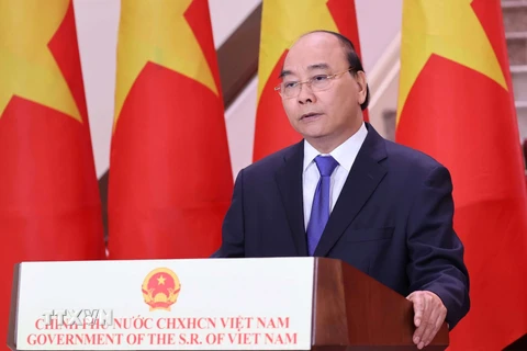 Thủ tướng Nguyễn Xuân Phúc biểu chúc mừng Hội chợ Trung Quốc-ASEAN (CAEXPO) lần thứ 17. (Ảnh: Thống Nhất/TTXVN)