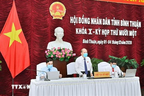 Chủ tọa Kỳ họp thứ 11 Hội đồng Nhân dân tỉnh Bình Thuận khóa X. (Ảnh: Nguyễn Thanh/TTXVN)