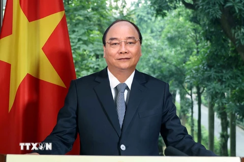 Thủ tướng Nguyễn Xuân Phúc gửi thông điệp đến Lễ kỷ niệm 60 năm thành lập Tổ chức Hợp tác và Phát triển kinh tế (OECD). (Ảnh: Thống Nhất/TTXVN)