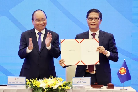 Thủ tướng Nguyễn Xuân Phúc, Chủ tịch ASEAN 2020 chứng kiến Lễ ký Hiệp định Đối tác Kinh tế Toàn diện Khu vực RCEP. (Ảnh: Thống Nhất/TTXVN)