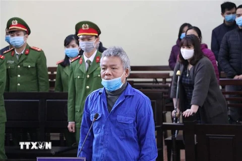 Bị cáo Nguyễn Văn Khuê khai nhận tội tại phiên tòa. (Ảnh: Thanh Hải/TTXVN)