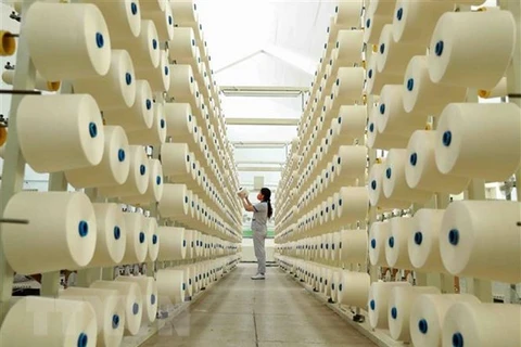 Dây chuyền sợi xuất khẩu tại Công ty TNHH dệt Phú Thọ. (Ảnh minh họa: TTXVN)