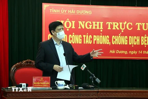 Ủy viên Trung ương Đảng, Bộ trưởng Bộ Y tế Nguyễn Thanh Long phát biểu tại hội nghị. (Ảnh: Mạnh Tú/TTXVN)