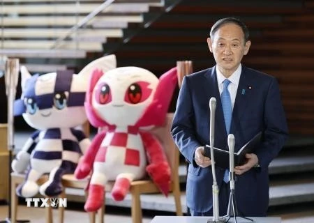 Thủ tướng Nhật Bản Suga Yoshihide tại cuộc họp báo ở Tokyo ngày 25/3/2021. (Ảnh: Kyodo/TTXVN)