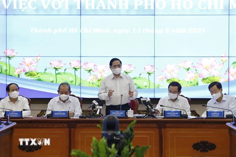 Thủ tướng Phạm Minh Chính phát biểu tại buổi làm việc. (Ảnh: Dương Giang/TTXVN)