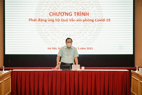 Chủ tịch Ủy ban Quản lý vốn nhà nước tại doanh nghiệp Nguyễn Hoàng Anh phát động chương trình ủng hộ Quỹ vaccine phòng Covid-19. (Nguồn: cmsc.gov.vn)