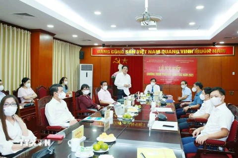 Lễ ký kết Chương trình phối hợp công tác giữa Ban Tuyên giáo Thành ủy Thành phố Hồ Chí Minh và Báo Điện tử Đảng Cộng sản Việt Nam năm 2021 theo hình thức trực tuyến. (Ảnh: Phương Hoa/TTXVN)