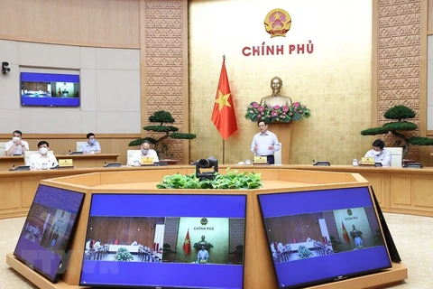 Thủ tướng Phạm Minh Chính phát biểu tại cuộc họp với các nhà sản xuất vaccine phòng COVID-19. (Ảnh: Dương Giang/TTXVN)