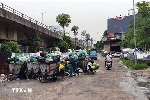 Điểm ùn ứ rác tại đường Yết Kiêu, phường Trần Hưng Đạo, thành phố Hạ Long đã được giải tỏa. (Ảnh: Bùi Đức Hiếu/TTXVN)