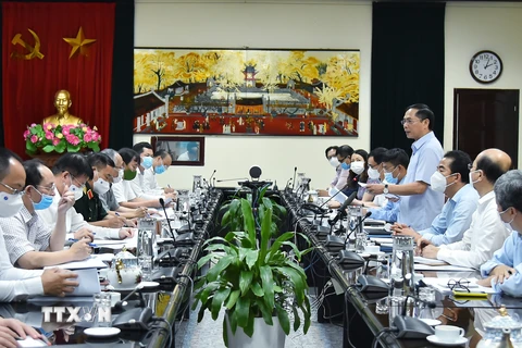 Bộ trưởng Bộ Ngoại giao Bùi Thanh Sơn, Tổ trưởng Tổ công tác của Chính phủ về ngoại giao vaccine chủ trì cuộc họp. (Ảnh: Lâm Khánh/TTXVN)
