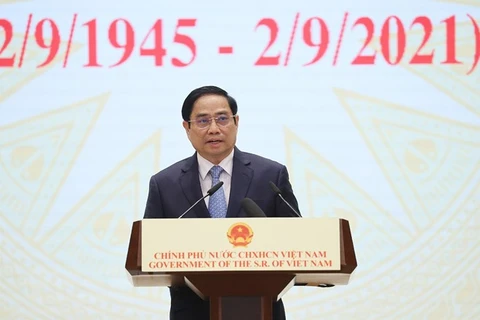 Thủ tướng Phạm Minh Chính đọc diễn văn tại lễ kỷ niệm. (Ảnh: Dương Giang/TTXVN)