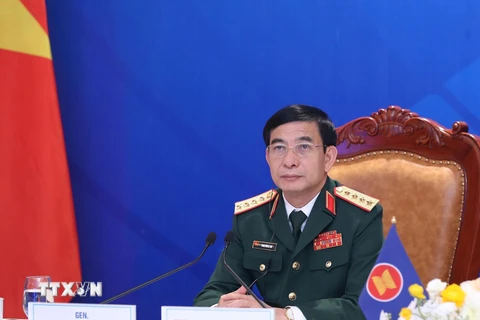 Đại tướng Phan Văn Giang, Bộ trưởng Bộ Quốc phòng Việt Nam dự tại điểm cầu Hà Nội. (Ảnh: Trọng Đức/TTXVN)