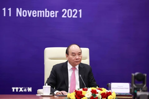 Chủ tịch nước Nguyễn Xuân Phúc tham dự Đối thoại. (Ảnh: Thống Nhất/TTXVN)