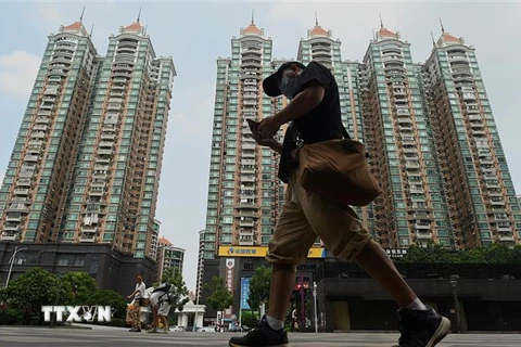 Các tòa nhà do tập đoàn bất động sản Evergrande xây dựng tại Quảng Đông, Trung Quốc. (Ảnh: AFP/TTXVN)