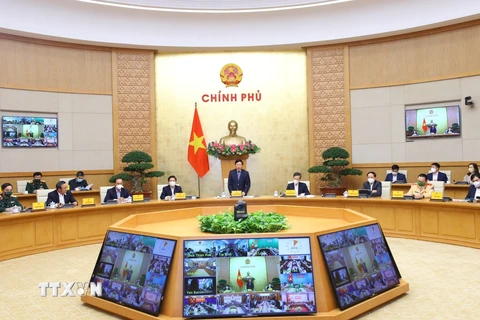 Phó Thủ tướng Thường trực Phạm Bình Minh, Chủ tịch Uỷ ban An toàn giao thông Quốc gia chủ trì Hội nghị. (Ảnh: Văn Điệp/TTXVN)
