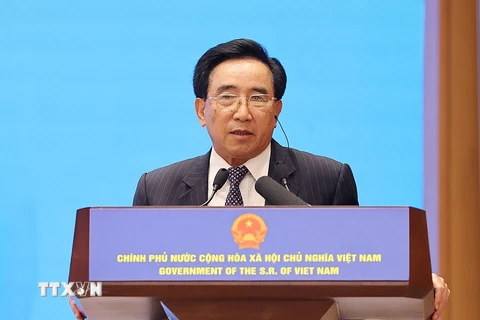 Thủ tướng Lào Phankham Viphavanh phát biểu tại buổi gặp gỡ doanh nghiệp hai nước. (Ảnh: Dương Giang/TTXVN)