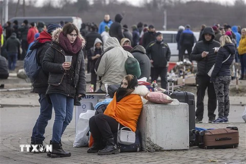 Người tị nạn Ukraine. (Ảnh: AFP/TTXVN)