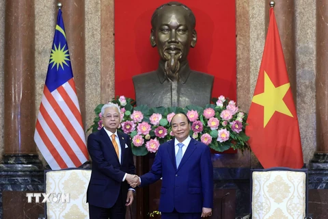 Chủ tịch nước Nguyễn Xuân Phúc tiếp Thủ tướng Malaysia Ismail Sabri Yaakob thăm chính thức Việt Nam. (Ảnh: Thống Nhất/TTXVN)