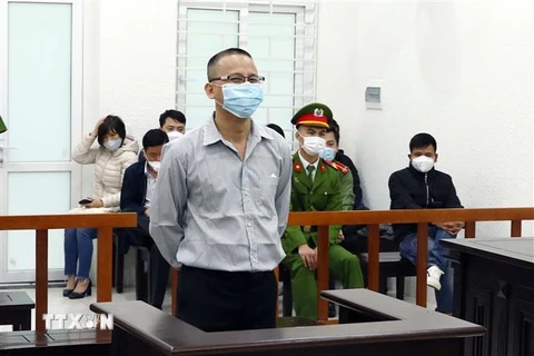 Bị cáo Lê Văn Dũng tại phiên tòa xét xử. (Ảnh: Phạm Kiên/TTXVN)