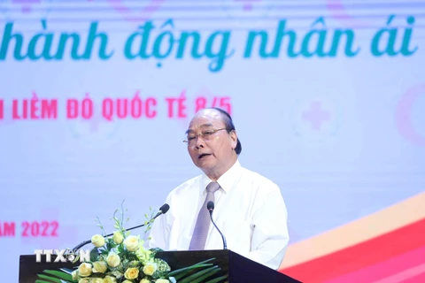 Chủ tịch nước Nguyễn Xuân Phúc phát biểu tại Lễ phát động Tháng Nhân đạo năm 2022. (Ảnh: Thống Nhất/TTXVN)