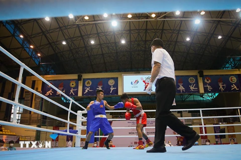 Một trận đấu của vận động viên Trần Văn Thảo. (Nguồn: TTXVN)