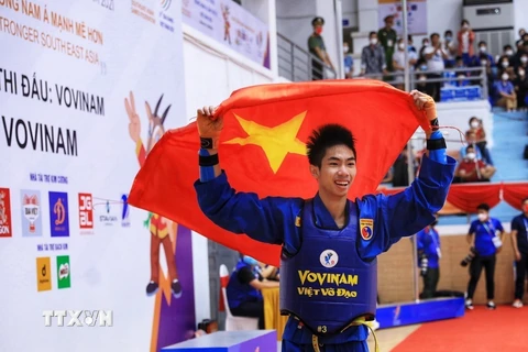 Vận động viên đội tuyển Vovinam Việt Nam Nguyễn Thanh Liêm giành huy chương Vàng ở nội dung đối kháng hạng cân 60kg nam. (Ảnh: Tuấn Anh/TTXVN)