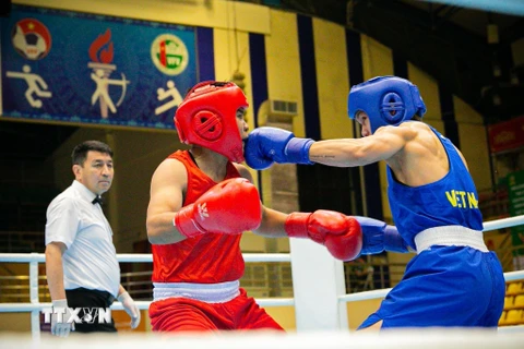 Một trận thi đấu boxing tại SEA Games 31. (Nguồn: TTXVN)