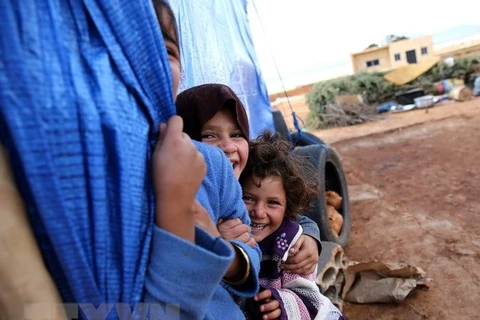 Trẻ em tị nạn Syria tại một trại tị nạn ở miền Đông Liban. (Nguồn: AFP/TTXVN)
