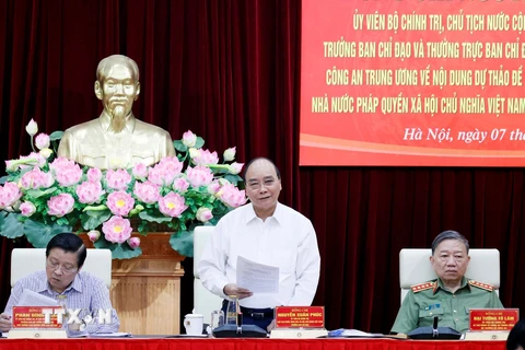 Chủ tịch nước Nguyễn Xuân Phúc làm việc với Đảng ủy Công an Trung ương về hoàn thiện Đề án xây dựng Nhà nước pháp quyền. (Ảnh: Thống Nhất/TTXVN)
