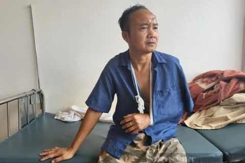 Ông Lê Văn Ba tại Trung tâm y tế huyện Bảo Lâm. (Nguồn: Cand)