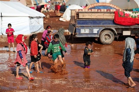 Trẻ em tại một trại tị nạn ở Syria. (Ảnh: AFP/TTXVN)