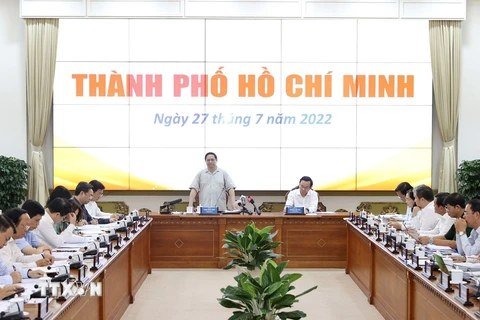Thủ tướng Phạm Minh Chính làm việc với lãnh đạo chủ chốt Thành phố Hồ Chí Minh. (Ảnh: Dương Giang/TTXVN)